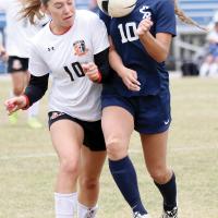 Krystiana Guzman runs through a Guymon player 