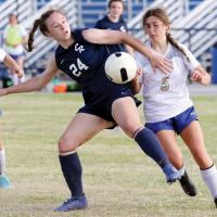 Carlie Golden steps in front of a Noble player to screen her off the ball