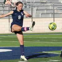 Conley Knapp clears the ball back down the field