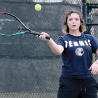 Kambry Maifield hits a return shot 
