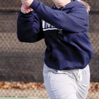 Melanna Idell follows through on a backhand return shot