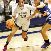 Nazhoni Sleeper drives around a defender
