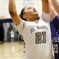 Pauline Black-Harmon eyes the basket on a shot along the baseline