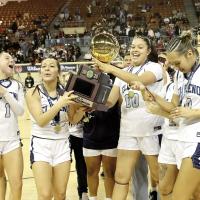 Emmary Elizondo, Phallyn McHenry-Guzman, Lilly Thomas and Eryn Roman Nose celebrate winning the Class 5A title with fans