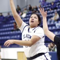 Lilly Thomas shoots a hook shot in the paint