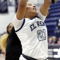 Pauline Black-Harmon (21) pulls down an offensive rebound that broke the school’s career rebound record