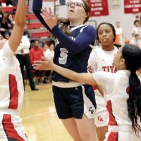 Raegan Bugaj shoots a jumper in traffic
