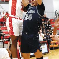 Tre Davis (24) draws contact on his shooting arm and lower body during the Indians final possession of the game
