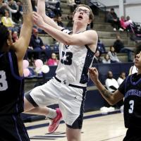 James Thompson shoots a jumper in the lane