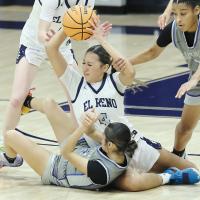 Eryn Roman Nose is fouled on the arm while trying to make a pass