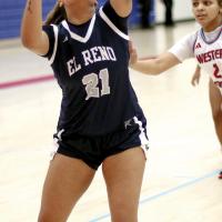 Pauline Black-Harmon eyes the basket before taking the shot that scored the bucket needed to push her to the 1,000-point career scoring mark