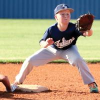 Garrett March looks a pickoff throw into his glove