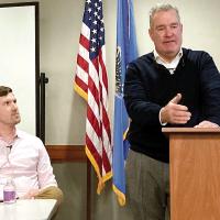 Steve Jensen (right) talks during El Reno Now event as Jeff Seymour listens