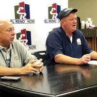 Craig McVay listens as Matt White talks