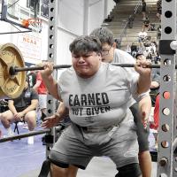 Armando Sauz-Gonzalez attempts a squat lift of 560 pounds