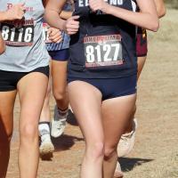 Lilly Owen runs along with a pack of competitors