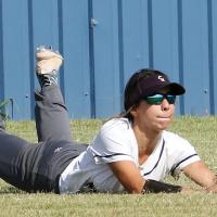 Krystiana Guzman dives to try and make a catch