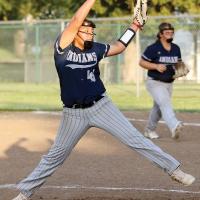 Miklyn Lumpmouth winds up to throw a pitch