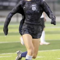Conley Knapp dribbles the ball up the pitch
