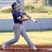 Chenoa White connects on her first-pitch home run