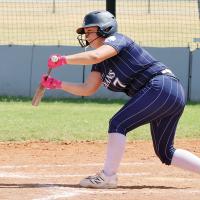 Daisy Hall (7) drops down a bunt in the Indians win over Bishop McGuinness