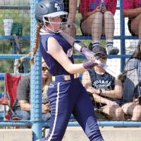 Maddie Moss fouls off a pitch