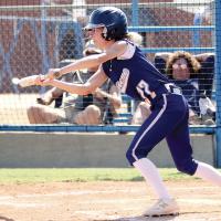 Ryah Hardy drops down a bunt in the Indians win over Lawton MacArthur