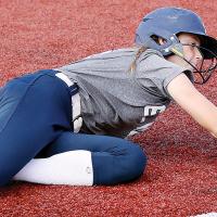 Iliana Ashford slides headfirst into third base