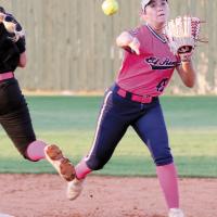 Kyla Killingsworth sidesteps a Carl Albert runner as she makes a throw on a double play attempt