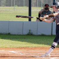 Maddie Moss connects with a pitch