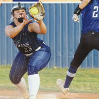 Lexi Porter gloves a throw to the bag as a Guthrie runner approaches