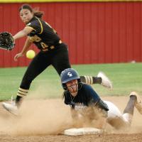 Iliana Ashford slides headfirst into second base