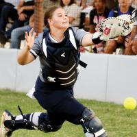 Bailey Brothers has a foul ball fall just short of her glove