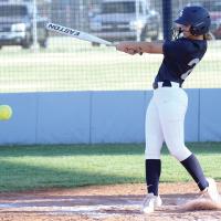 Jacy Little keeps a close eye on the ball after a slap hit attempt
