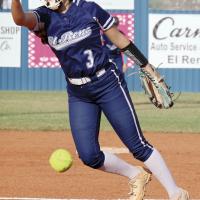 Zoey Pawnee gets both feet off the ground as she leans into a pitch