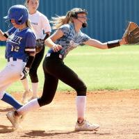 Iliana Ashford steps in front of a base runner