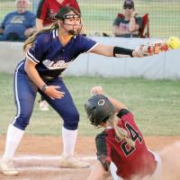 Taylor Acosta looks back at a sliding Weatherford base runner