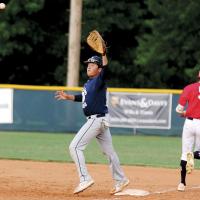 Hernon Blanco reaches up to snag a throw to first