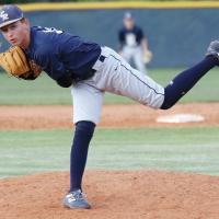 Mason Fulton watches a pitch sail toward the plate