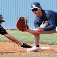 Mason Fulton looks a pickoff throw into his glove
