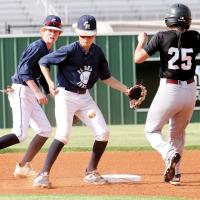 Gabe Compton tries to knock down a pickoff throw