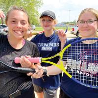 Riley Connor, Kenzie Holsted and Carlota Monje hold up their regional medals