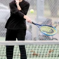 Xiven Wallin returns a shot