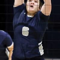 Jewell Graham attempts to reject a shot by a Shawnee hitter