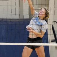 Bailey Denwalt slaps down the ball during a preseason practice