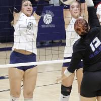 Ruby Curtis (6) and Brantlie Charmasson set up for a double block attempt 