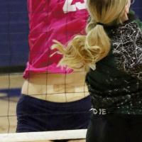 Savannah Robinson attempts a solo block