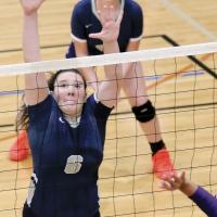 Jewell Graham attempts a block