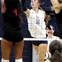 Brantlie Charmasson tips a shot over a solo block attempt