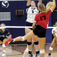 Jewell Graham blocks a shot at the net